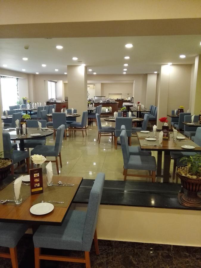 Ah Hotel And Conferences Madina Bagian luar foto