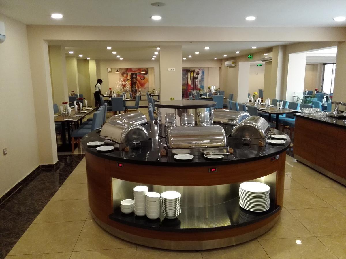 Ah Hotel And Conferences Madina Bagian luar foto